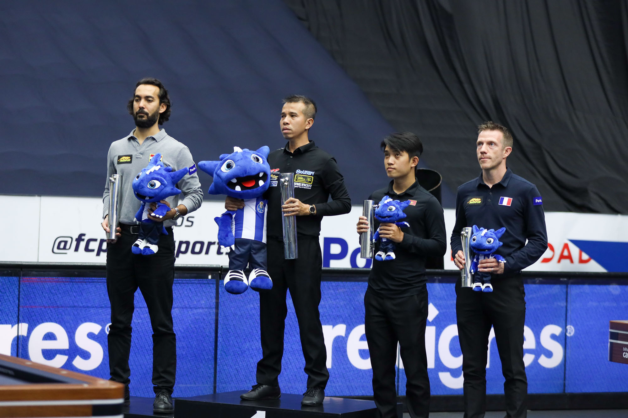 <em>Vietnamese billiards player Tran Quyet Chien (L, 2nd) wins the Porto World Cup held in Portugal, July 2, 2023. Photo: </em>Union Mondiale de Billard