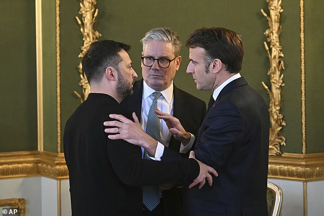Britain's Prime Minister Keir Starmer, center, Ukraine's President Volodymyr Zelenskyy, left, and France's President Emmanuel Macron meet during the European leaders' summit