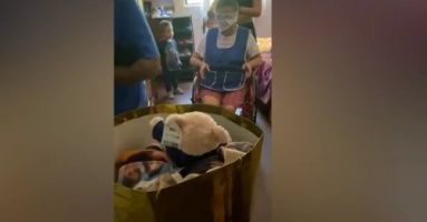 Loving grandma gets a long-awaited gift bag surprise